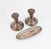 TIFFANY & Co. American silver oval dish, together with a pair of vintage sterling silver candle holders (weighted bases), 20th century, (3 items), ​​​​​​​the dish 17cm wide, 70 grams.
