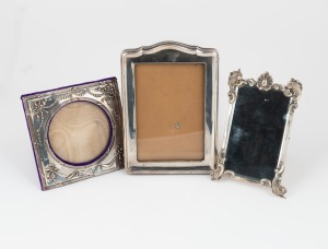 119 · Three sterling silver picture frames, early 20th century, the largest 19 x 13cm overall.