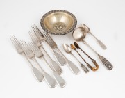 Russian silver ladle and assorted cutlery, together with a pair of German silver gilt sugar tongs and a Continental silver bowl, 19th/20th century, (11 items), 620 grams total.