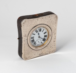 An antique steel cased oversized pocket watch, housed in an attractive sterling silver and leather travelling case lined in plush green velvet, 19th century, the case 11.5 x 10cm overall.