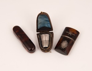 An antique sterling silver thimble in leather case, together with a fine quality Georgian tortoise shell and silver needle case and a tortoise shell needle, 19th century, (3 items), ​​​​​​​the largest 5.5cm long.