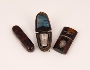 An antique sterling silver thimble in leather case, together with a fine quality Georgian tortoise shell and silver needle case and a tortoise shell needle, 19th century, (3 items), ​​​​​​​the largest 5.5cm long.