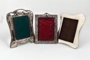 Three vintage and antique sterling silver picture frames, 19th/20th century, the largest 19.5cm high