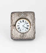 An antique oversized nickel plated pocket watch with crown wind movement, Roman numerals and subsidiary seconds dial, housed in an antique sterling silver and leather travel case (the case poor condition), the watch 9.5cm high overall including bow - 3