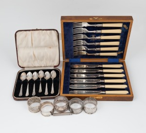 Five assorted sterling silver napkin rings; together with a boxed set of silver plated teaspoons, a boxed set of fish cutlery with ivory handles in timber case and a silver retractable pencil, 19th/20th century, (8 items), the napkin rings 106 grams total