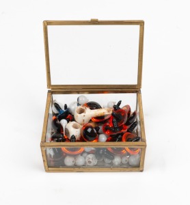 Assorted antique and vintage glass eyes, together with an assortment of plastic examples, (qty).