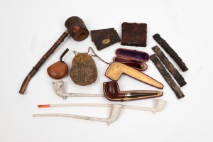 TOBACCO, group of antique and vintage pipes, plug tobacco and cigar holder, 19th/20th century, (13 items), ​​​​​​​the largest 32cm long
