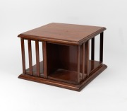 An antique mahogany&nbsp;desk top revolving book stand, circa 1900, ​​​​​​​28cm high, 38cm wide, 38cm deep