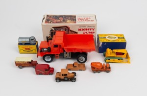 "MATCHBOX" SERIES made by LESNEY. A collection of seven vintage die cast model toys, two in original packing. Together with a boxed "TOMY" battery operated Mighty Dump Truck. 20th century, ​​​​​​​8 items, the largest 20cm long.
