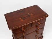 An Australian cedar and pine miniature five drawer apprentice chest with floral marquetry decoration to the top and ownership details "Mrs E. G.", 39cm high, 35cm wide, 22cm deep - 2