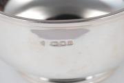 A vintage five piece English sterling silver tea and coffee service in the Georgian style with ebonised timber handles, manufactured in London, 20th century, the largest 22cm high, 2458 grams total (including handles) - 2