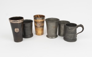 Antique pewter beakers and mug; together with two attractive antique horn and silver mounted examples, 19th/20th century, (6 items), the largest 13cm high