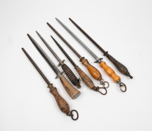 Group of seven assorted sharpening steels including horn handled examples (one stamped "DICK"), 19th/20th century, ​​​​​​​the largest 52cm long
