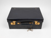An antique sterling silver topped vanity set housed in original fitted blue leather travel case, early 20th century, the case 48cm wide - 2