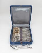 A set of French silver fiddle and shell pattern dinner forks (12) and spoons (12), 20th century, (24 items), ​​​​​​​the spoons 18cm long, 1220 grams total.