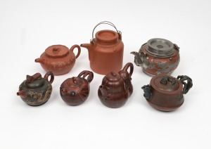 YIXING&nbsp;group of seven Chinese pottery teapots, 20th century, the largest 17cm high including handle.
