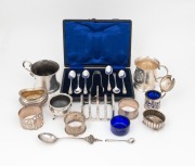 Assorted sterling silver christening mugs, toast rack, napkin rings, condiments, boxed teaspoon and sugar tong set, etc, 19th and 20th century, (qty), 420 grams silver weight (not including glass liners).