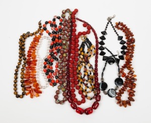 Eleven assorted vintage bead necklaces