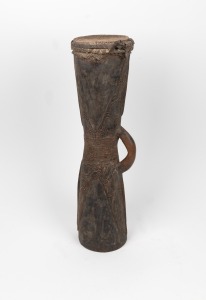 A tribal drum carved wood and lizard skin with remains of lime finish, Papua New Guinea origin, circa 1965,&nbsp; ​​​​​​​60cm long