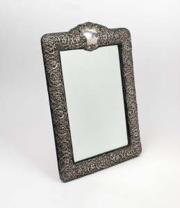 An antique sterling silver framed table mirror of impressive proportions, 19th/20th century, 51 x 36cm overall