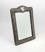 An antique sterling silver framed table mirror of impressive proportions, 19th/20th century, 51 x 36cm overall