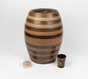 Antique pottery cordial barrel with ribbed decoration; together with "Cherry Toothpaste" antique paste pot (with contents) and a Dutch Gouda pottery beaker with floral decoration, (3 items), the barrel 43cm high