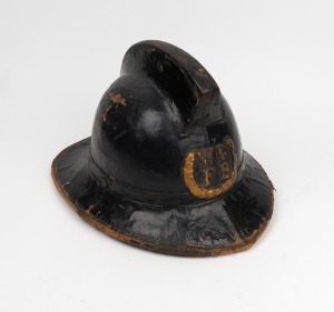 An antique English fireman's helmet, 19th century