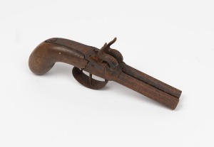 An antique percussion cap side by side pocket pistol in barn find relic condition, early to mid 19th century, 20.5cm long.