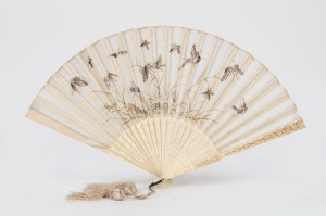 An antique Chinese carved ivory and embroidered silk fan, 19th century, ​​​​​​​30cm high, 49cm wide