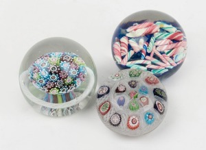 Three Murano glass paperweights, the largest 7cm high.