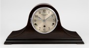 WILSON & WILSON vintage English "Napoleon Hat" mantle clock in walnut case with three train&nbsp;Westminster chiming and gong striking movement, circa 1930, 24cm high, 48cm wide.