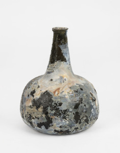 An antique Dutch glass onion bottle, 17th century, 17cm high