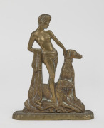 A vintage cast brass statue of a lady with two hounds, circa 1920, ​​​​​​​19.5cm high.