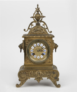 An antique French bronze cased mantle clock with eight day time and bell striking movement, 19th century, 35cm high.