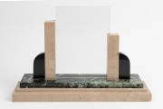 A French marble menu/picture stand, circa 1925, 30cm high, 42cm wide