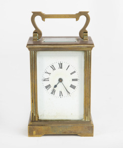 An antique French carriage clock with Roman numerals, 19th/20th century, 15cm high