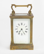 An antique French carriage clock with Roman numerals, 19th/20th century, 15cm high