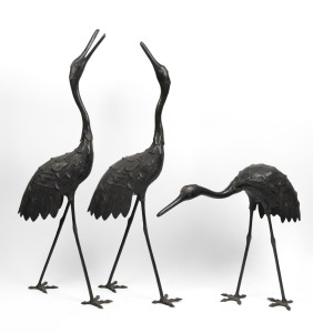 Three Japanese bronze crane garden ornaments, 20th century, the largest 88cm high
