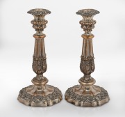 A pair of antique Sheffield plated candlesticks, early to mid 19th century, ​​​​​​​29cm high.