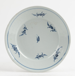 A Continental antique blue and white tin glazed earthenware dish, 18th century, 23cm diameter