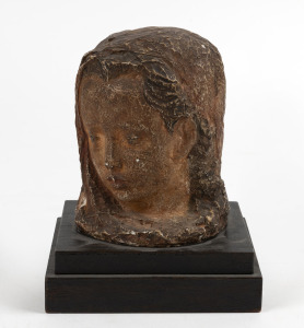 Antique fired plaster and hand-painted head of a girl on timber plinth, 19th/20th century, 17cm high overall