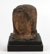 Antique fired plaster and hand-painted head of a girl on timber plinth, 19th/20th century, 17cm high overall