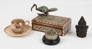 Satsuma cup and saucer, bronze Buddha head, unusual carved jade bird with bronze feet and head and two Indian trinket boxes, mixed vintages, the larger box 16cm wide