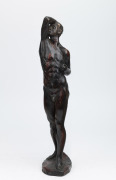 A vintage bronze statue of a standing male nude, early to mid 20th century, monogram to base (illegible), ​​​​​​​41cm high.