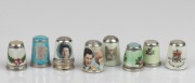 THIMBLES: A selection of silver and enamel examples including Royal themes, 20th century, (8 items), the largest 2.5cm high