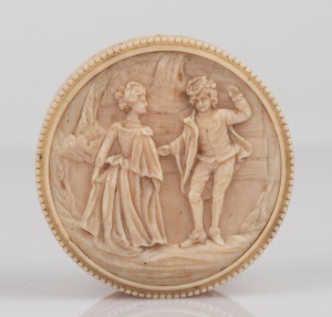 190 · An antique French Dieppe carved ivory circular trinket box with romantic scene, 19th century, ​​​​​​​3cm high, 6cm diameter.