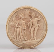 An antique French Dieppe carved ivory circular trinket box with romantic scene, 19th century, ​​​​​​​3cm high, 6cm diameter.