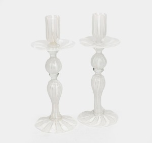 A pair of white latticino Murano glass candlesticks, mid 20th century, 24cm high.
