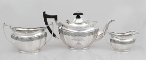 An antique English three piece sterling silver tea service by Herbert & Frank Barker, circa 1908, bearing inscription "Presented To W.J. ROSE By The Officers Of His Regiment, October, 1908". the teapot 14cm high, 1120 grams total.