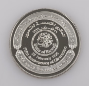 Three American 1 oz. silver dollars, together with a boxed 1998 Central Bank Of Kuwait 1 oz. silver coin, (4 items)
